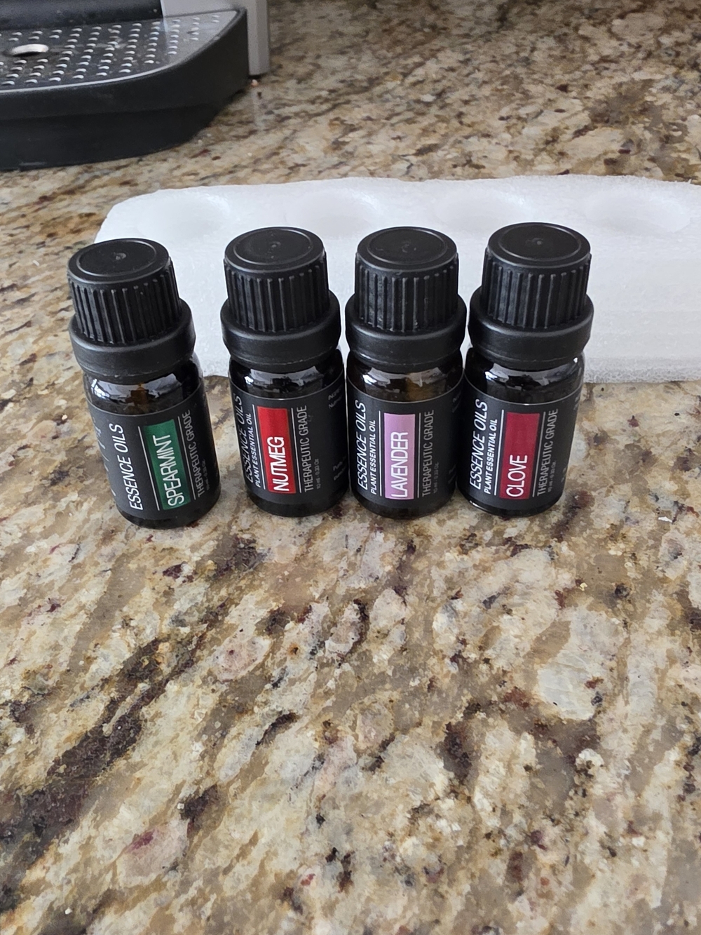 Assorted Essential Oil Bottles - Spearmint, Nutmeg, Lavender, Clove
